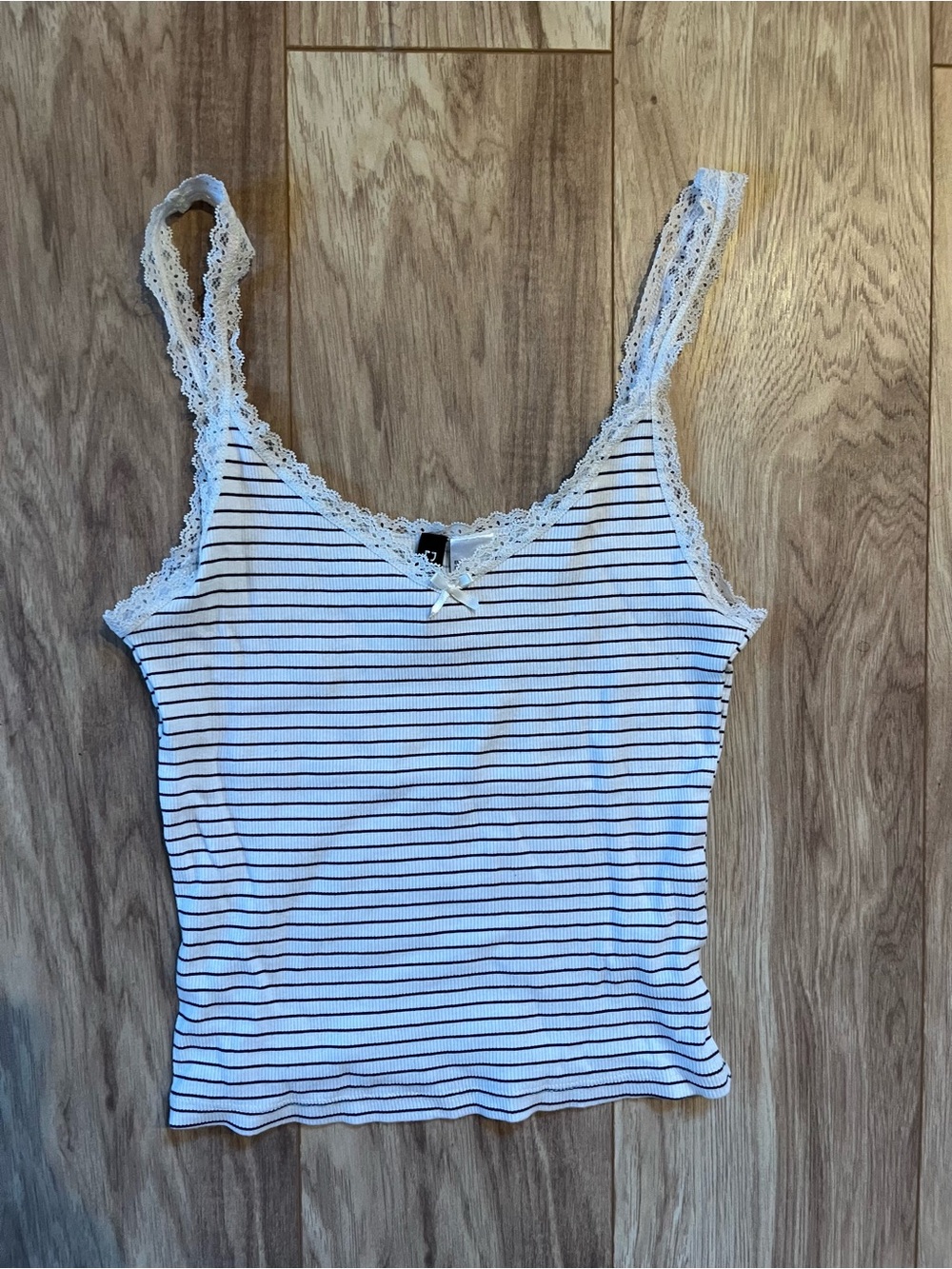 Adorable white & black tank top with lace trim & a bow